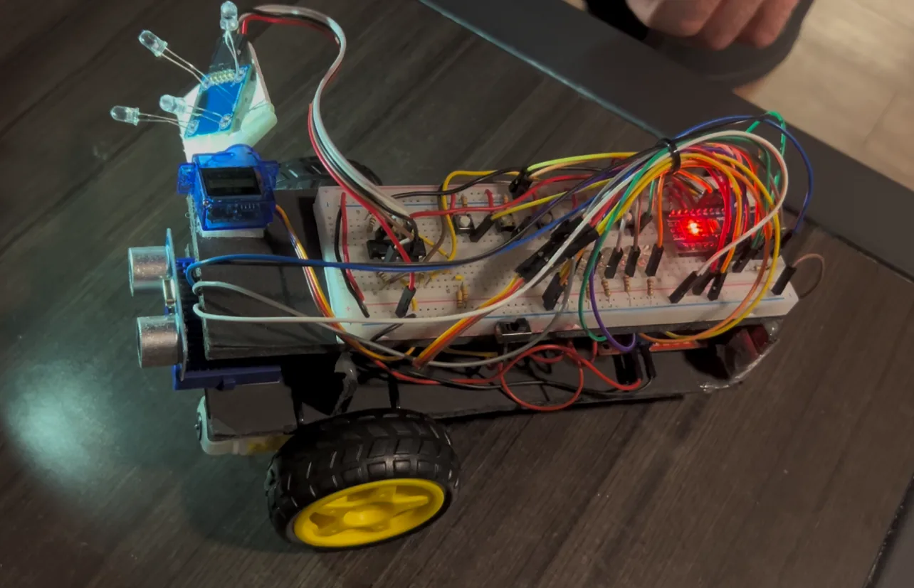 Finished light-following robot with sensors, motors, and control electronics assembled on the chassis.